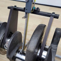 Crankshaft stroke checker set up to measure