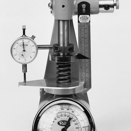 Valve spring height indicator installed on a classic Rimac spring tester